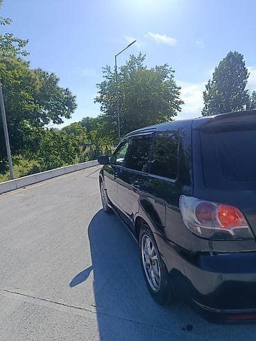 man sat: Mitsubishi Airtrek: 2 l | 2002 il 258000 km Van/Minivan — 3