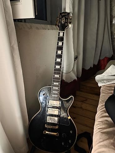 Gibson Les paul Black Beauty. Epiphone pickuplardır. Grover tunerləri