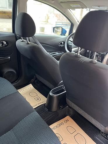 baqaj ustu: Nissan Note hatchback – mavi rəngdə, şəhər üçün kompakt və qənaətcil — 10