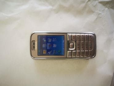 ТВ и видео: Nokia цвет - Коричневый, Кнопочный — 4