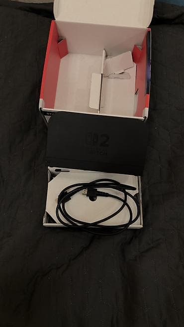 switch 2: Nintendo Switch 2 Dok Stansiyası (Dock station), zavod qutusu və — 2
