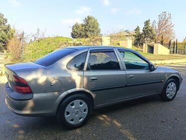 Çəngəllər: Opel Vectra: 1.8 l | 1996 il 193000 km Sedan — 16