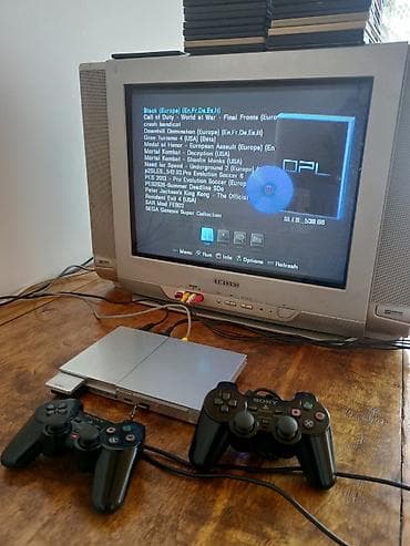 Sony PlayStation 2 Slim oyun seti - Model: PS2 Slim (gümüş rəng) -