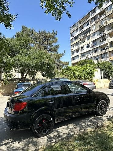 diskilər: Kia Rio: 1.4 l | 2008 il Sedan — 4