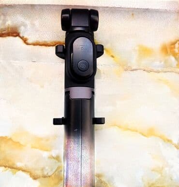 ştativlər: Selfi çubuğu. Bulutuz ilə qoşulur. Ayaqları var.Üzərində zaratika — 1