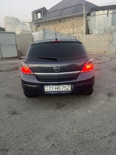 kia sportage 2006: Opel Astra H – 5 qapılı hetçbek Xüsusiyyətlər: - Kuzov — 7