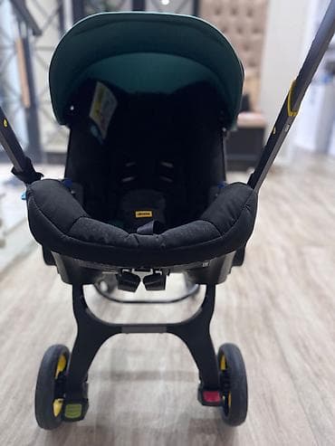 коляска: Doona автокресло+ коляска для младенца. Состояние идеальное!! Покупали — 6
