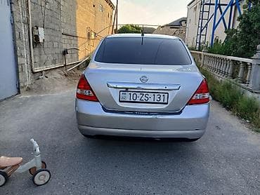 Nissan Tiida: 1.6 l | 2007 il Sedan — 5