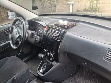 купить чехлы на авто: Hyundai Tucson: 0.2 л | 2005 г. Внедорожник — 5