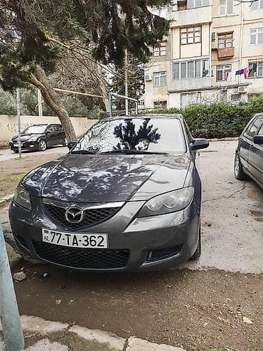 qapi zili: Mazda 3 sedan - Kuzov: sedan, tünd-boz rəng - Mühərrik: benzin (detal — 2