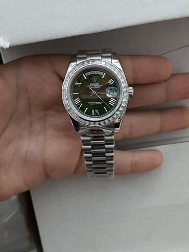 richard mille saat qiymeti: Rolex Day-Date — 1