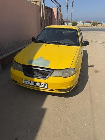 Model: Daewoo Nexia (sedan) Rəng: sarı Kuzov: 4 qapılı, ön və arxa