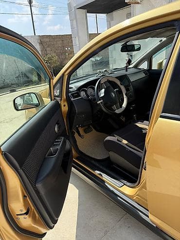 Motonəqliyyat: Nissan Tiida: 1.6 l | 2012 il Hetçbek — 4