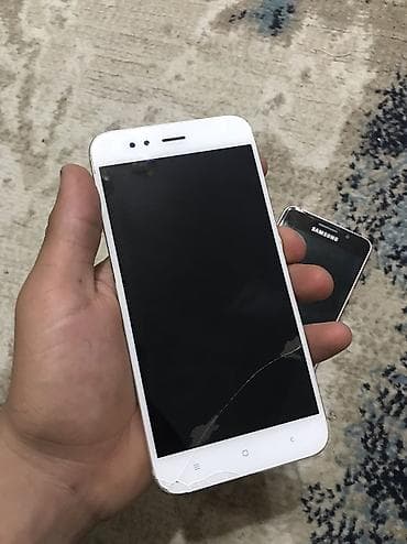 samsung a3 2017 qiyməti: Xiaomi Mi A1, 64 GB, rəng - Qızılı, 
 Sensor, Barmaq izi, İki sim kartlı — 1