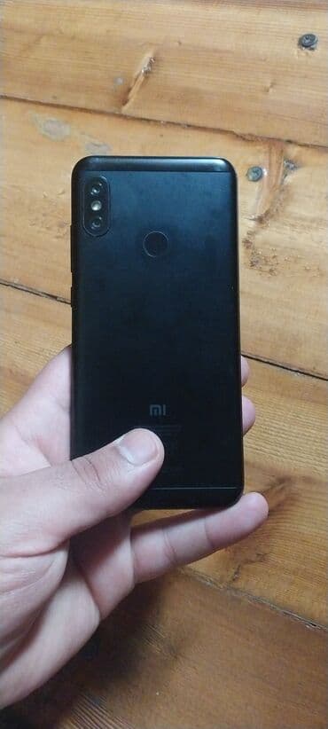 mi qulaqciqlar: Xiaomi Mi A2 Lite, 32 ГБ, цвет - Черный, 
 Отпечаток пальца, Две SIM карты — 2