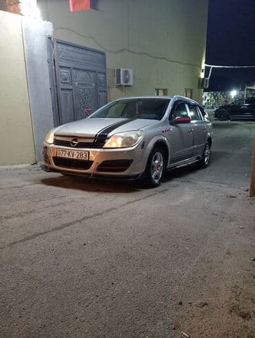 kia ceed 2010: Opel Astra: 1.3 l | 2006 il 295000 km Universal — 5