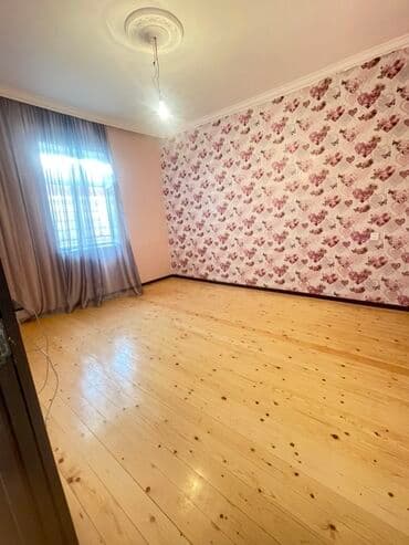 kirayə evlər binəqədidə: Bu mənzildə taxta döşəmələr, müasir divar kağızları və geniş — 1