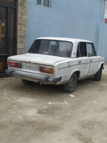 ваза стеклянная прозрачная высокая без узора: VAZ 2106, ağ rəngli, sedan kuzov. Xüsusiyyətlər: - Klassik “06” — 2