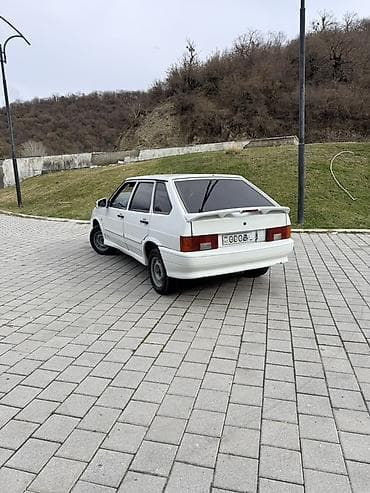 ilkin odənişsiz avtomobil: Avtomobil: LADA Samara (VAZ-2114) hatchback Kuzov: 5 qapılı, ağ rəng — 8