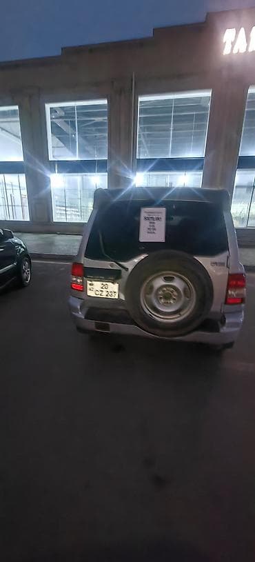 moto debilqe: Mitsubishi Pajero iO (GDI) – kompakt 4x4 krossover/SUV - Gümüşü rəng — 3