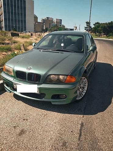 mazda 2: BMW 3 series: 2.5 l | 2000 il Sedan — 2