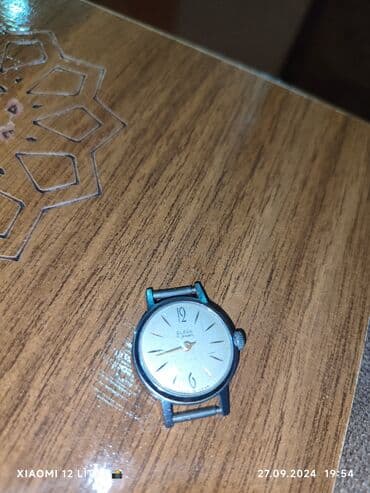 el fecr saat: İşlənmiş, Qol saatı — 1