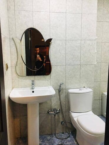 mida az: Mənzil Hövsan MİDA 1 yaşayış kompleksinde 2 otaqlı, 7 mərtəbəli — 12