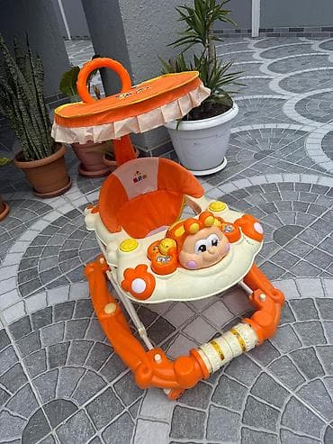 çəlik nədir: Uşaq gəzdirəcəyi / yırğaclı yerimə arabası - Rəng: narıncı-krem - — 2
