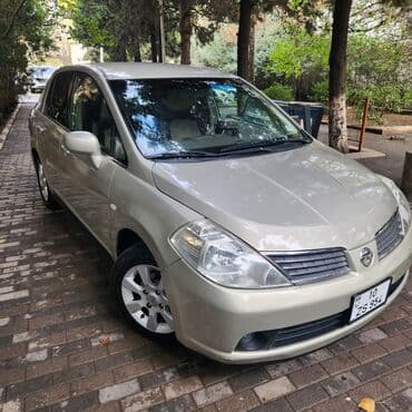 kvadrasikl satılır: Nissan Tiida sedan – gümüşü rəng Texniki xüsusiyyətlər və təchizat: - — 3