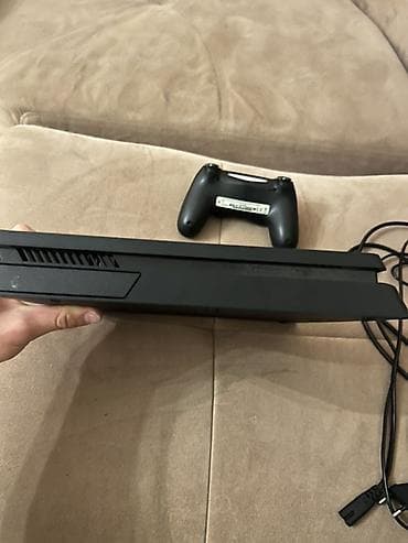 ps4 pro 2tb: PlayStation 4 Slim (qara) oyun konsolu Paketə daxildir: - PS4 Slim — 4