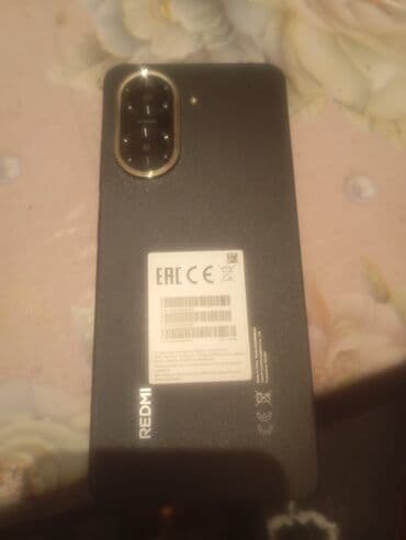 bakcell cut nomreler: 230 - Brend: Redmi (Xiaomi) - Rəng: Qara, qumlu teksturalı arxa səth — 1