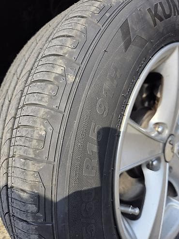 kia optima diffuser: Şin Kumho 205 / 60 / R 15 — 2
