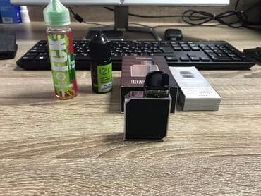 iqos iluma i: Elektron Siqaret. Uzerinde 2 eded maye ve 3 eded yeni basliq verilir — 1