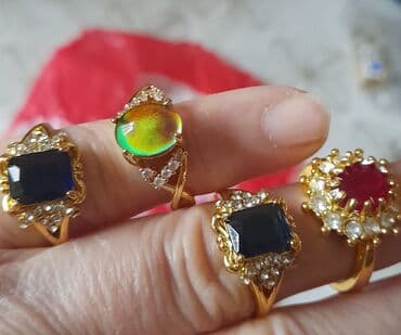 sebeke qizil sirqalar: Qadın bəzək dəsti – üzük, sırğa və qolbaq Məhsul təsviri: - Qızılı — 2