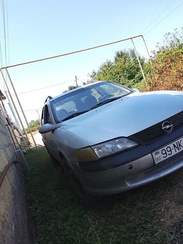 опель зафира а: Opel Vectra: 2 l | 1998 il 131855 km Universal — 4