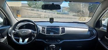 Kia Sportage: 2 л | 2013 г. Внедорожник — 6
