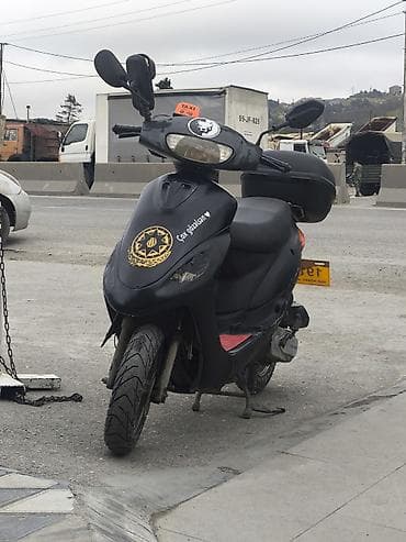 Mopedlər,skuterlər: Skuter – şəhərdaxili sürüş və çatdırılma üçün praktik model — 1