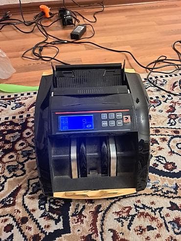 İşlənmiş pul sayan aparat satılır. Model: 5800D UV/MG. Aparat işlək — 1