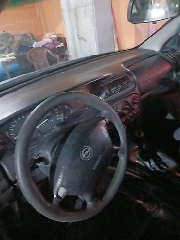 qazel radiator: Opel Omega: 2 l | 1996 il 300000 km Sedan — 5