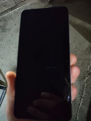 Məhsul: Smartfon Xüsusiyyətlər: - Rəng: Boz/gümüşü arxa panel -