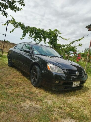 maşın mator: Nissan Altima: 2.5 l | 2005 il Sedan — 11