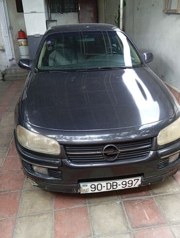 diffuser satisi: Opel sedan - Kuzov: 4 qapılı sedan, tünd rəng - Nömrə: AZ 90-DB-997 — 2