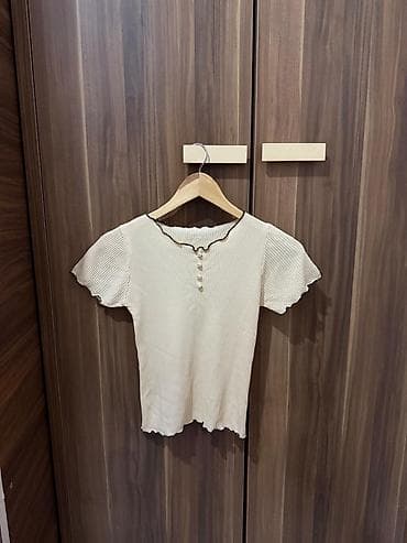 ana bala geyimi: Xs s m razmerler her biri 5 azn Qadın geyim dəsti – 4 məhsul 1) Ağ — 9