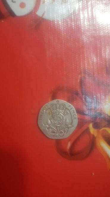 20 cent nece qepikdir: Səkkizguşəli formaya malik bu metal pulun bir üzündə Kraliça II — 2