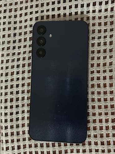 irşad electronics telefonlar: Mavi rəngdə smartfon - Arxa tərəfdə ayrı-ayrı yerləşdirilmiş 3 — 1