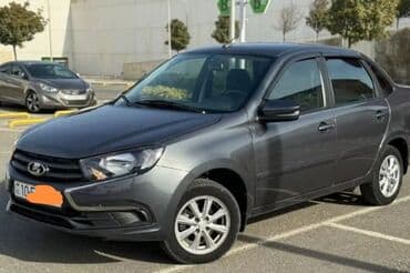 vaz 2103: Lada Granta sedan – tünd boz rəngdə, kompakt və qənaətcil şəhər — 1