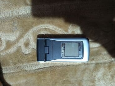 ТВ и видео: Nokia N90, Кнопочный — 6