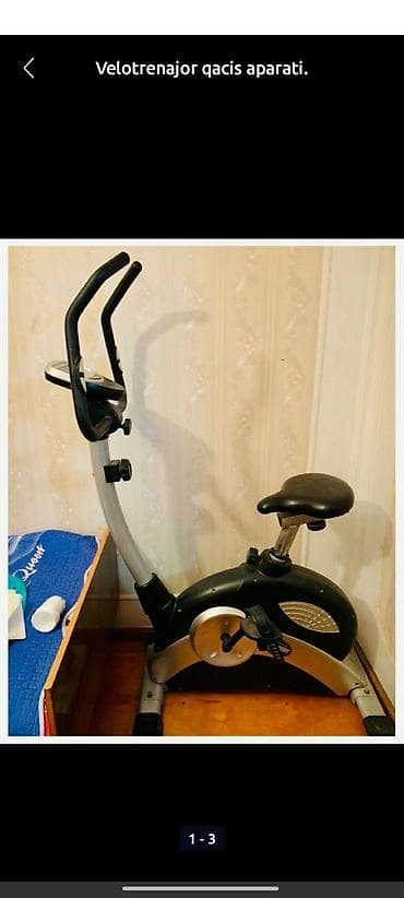Velotrenajor – evdə kardio məşqi üçün stasionar velosiped. - Şaquli