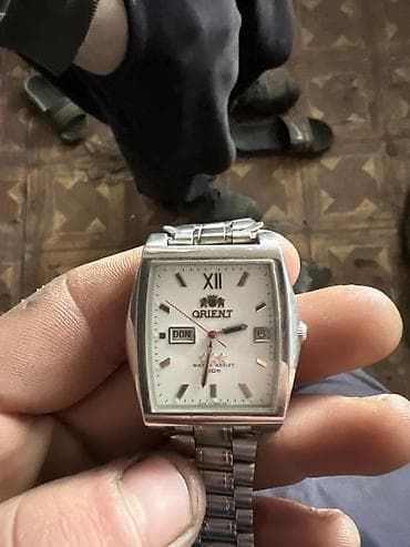 купить золотой браслет в баку: Наручные часы, Orient, цвет - Серебристый — 1