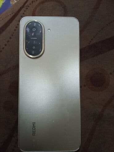 Apple iPhone: Məhsul: Redmi smartfon Xüsusiyyətlər: - Korpus: Gümüşü rəngli arxa — 1